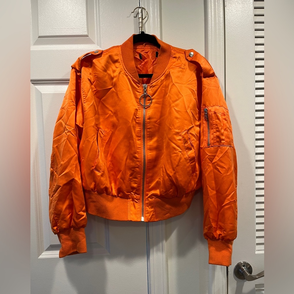 Orange bomber jacket